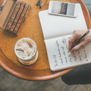 woman writing to do list